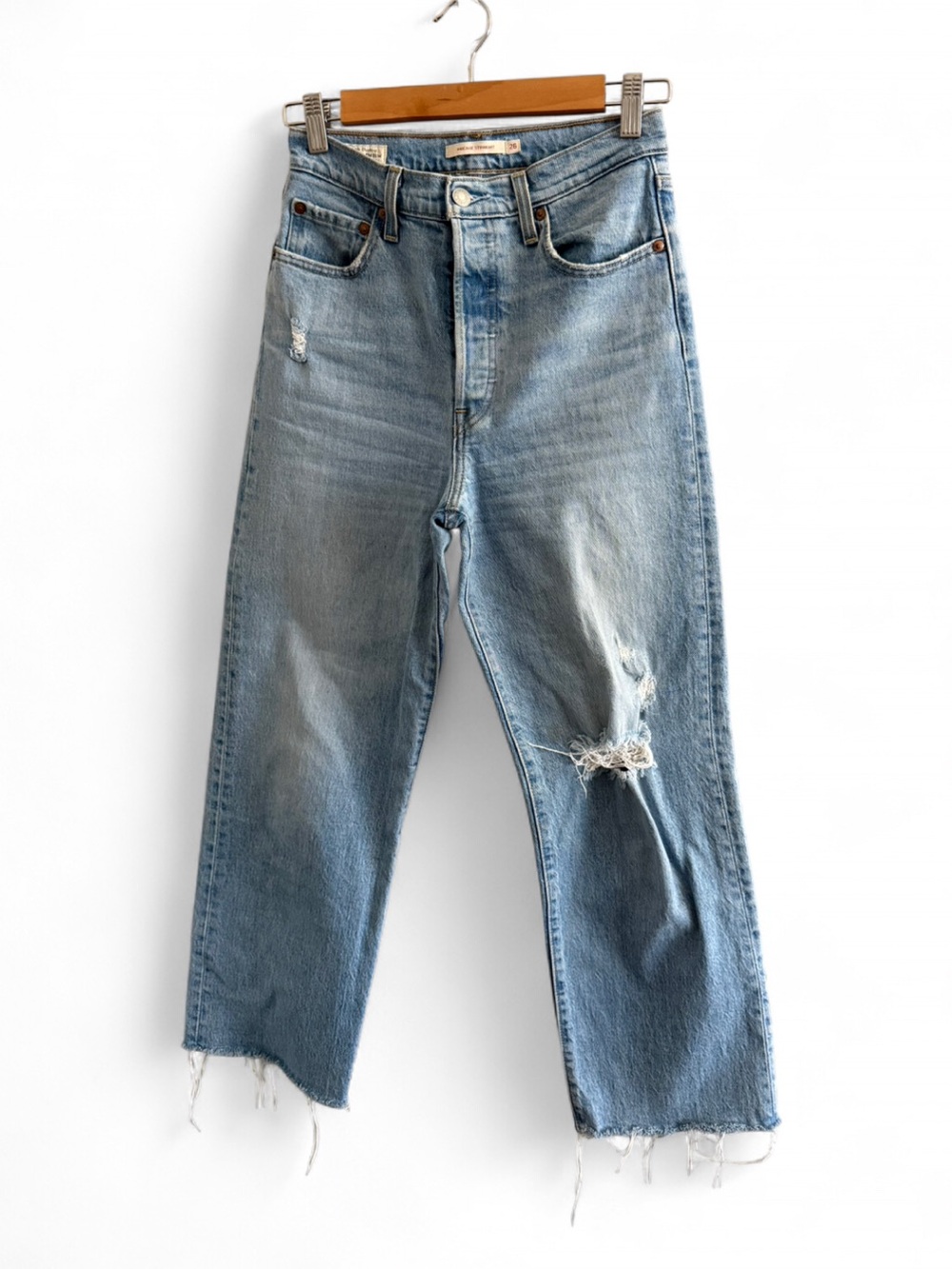 Levi's Light Blue Ribcage Straight Jeans with Distressed Knee and Frayed Hem